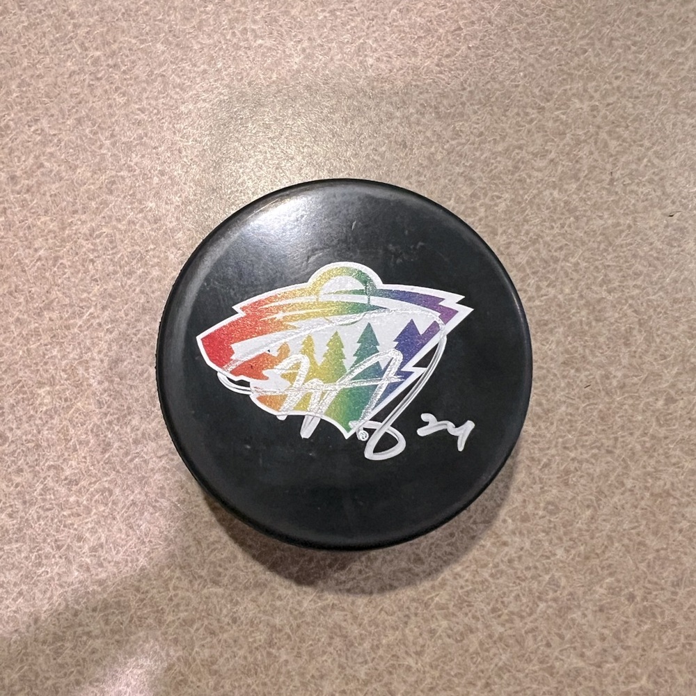 Autographed Matt Dumba Pride Night Puck Minnesota Wild